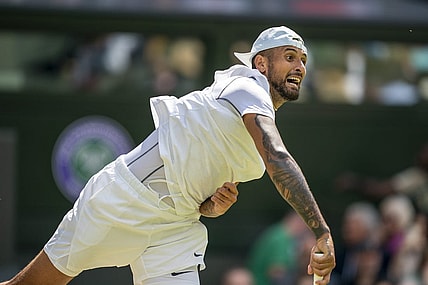 Jul 4, 2022; London, United Kingdom; Nick Kyrgios (AUS) serves during his match against Brandon Nakashima (USA) on day eight at All England Lawn Tennis and Croquet Club. Mandatory Credit: Susan Mullane-USA TODAY Sports