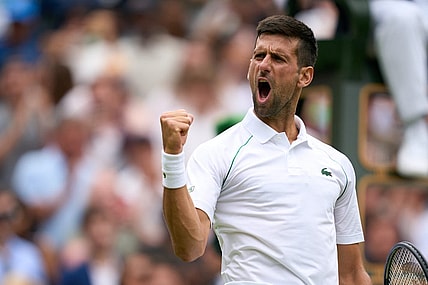 Jul 5, 2022; London, England, United Kingdom; Novak Djokovic (SRB) celebrates after match point against Jannik Sinner (ITA) during a quarterfinals mens singles match on Centre court at the 2022 Wimbledon Championships at All England Lawn Tennis and Croquet Club. Mandatory Credit: Peter van den Berg-USA TODAY Sports