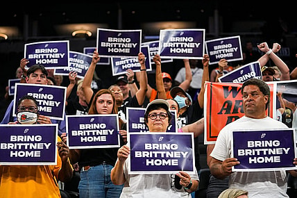Attendees lift up their signs during a rally for Brittney Griner's release at the Footprint Center on July 6, 2022, in Phoenix.

Dsc04342