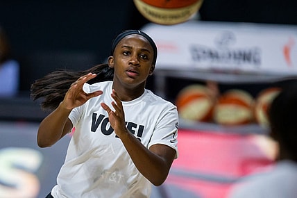 Sep 29, 2020; Bradenton, Florida, USA; Las Vegas Aces guard Jackie Young (0) warms up in a "Vote!" shirt before game 5 of the WNBA semifinals between the Connecticut Suns and the Las Vegas Aces at IMG Academy. Mandatory Credit: Mary Holt-USA TODAY Sports