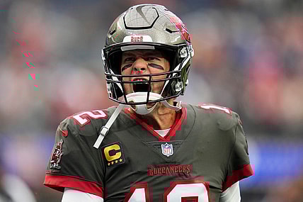 Sep 26, 2021; Inglewood, California, USA; Tampa Bay Buccaneers quarterback Tom Brady (12) yells at Bucs fans as he takes the field for pregame warmups before playing the Los Angeles Rams. Mandatory Credit: Robert Hanashiro-USA TODAY Sports