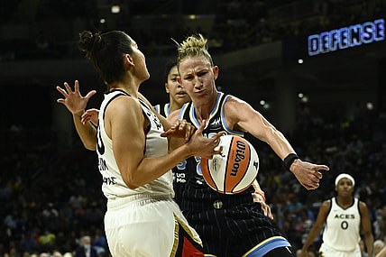 Jul 26, 2022; Chicago, IL, USA;  Chicago Sky forward Candace Parker (3), back and Chicago Sky guard Courtney Vandersloot (22) fight for the ball against Las Vegas Aces guard Kelsey Plum (10) during the second half of the Commissioners Cup-Championships at Wintrust Arena. Mandatory Credit: Matt Marton-USA TODAY Sports