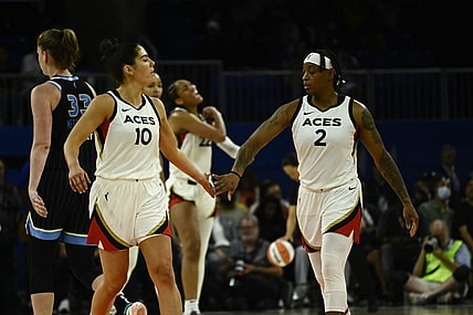 Jul 26, 2022; Chicago, IL, USA;  Las Vegas Aces guard Kelsey Plum (10) and Las Vegas Aces guard Riquna Williams (2) high five against the Chicago Sky during the second half of the Commissioners Cup-Championships at Wintrust Arena. Mandatory Credit: Matt Marton-USA TODAY Sports