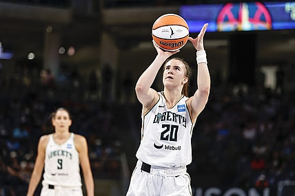 Jul 29, 2022; Chicago, Illinois, USA; New York Liberty guard Sabrina Ionescu (20) shoots a free throw against the Chicago Sky during the second half of the WNBA game at Wintrust Arena. Mandatory Credit: Kamil Krzaczynski-USA TODAY Sports