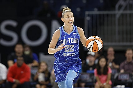 Jul 29, 2022; Chicago, Illinois, USA; Chicago Sky guard Courtney Vandersloot (22) brings the ball up court during the first half of the WNBA game against the New York Liberty at Wintrust Arena. Mandatory Credit: Kamil Krzaczynski-USA TODAY Sports