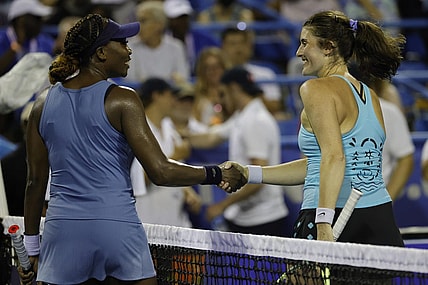 Aug 1, 2022; Washington, DC, USA; Venus Williams (USA) (L) shakes hands with Rebecca Marino (CAN) (R) after their match on day one of the Citi Open at Rock Creek Park Tennis Center. Mandatory Credit: Geoff Burke-USA TODAY Sports