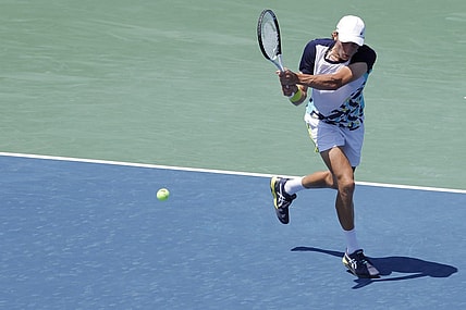 Aug 3, 2022; Washington, DC, USA; Emil Ruusuvuori (FIN) hits a backhand against Hubert Hurkacz (POL) (not pictured) on day three of the Citi Open at Rock Creek Park Tennis Center. Mandatory Credit: Geoff Burke-USA TODAY Sports