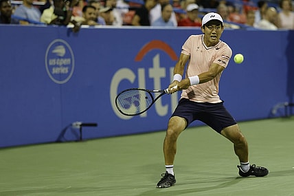 Aug 6, 2022; Washington, DC, USA; Yoshihito Nishioka (JPN) hits a backhand against Andrey Rublev (not pictured) in a men's single's semifinal on day six of the Citi Open at Rock Creek Park Tennis Center. Mandatory Credit: Geoff Burke-USA TODAY Sports