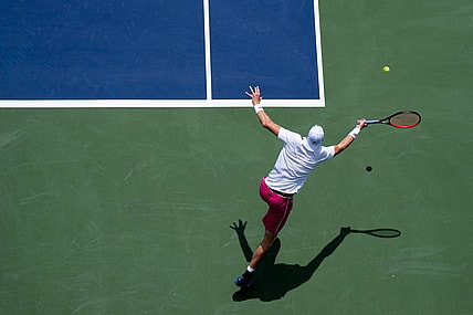 John Isner returns to Benjamin Bonzi during the Western & Southern Open at the Lindner Family Tennis Center in Mason, Ohio Monday, Aug. 15, 2022.

Western Southern Open Day Two Morning 68