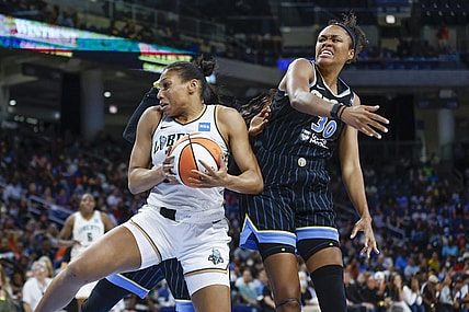 Aug 17, 2022; Chicago, Illinois, USA; New York Liberty forward Betnijah Laney (44) goes to the basket against Chicago Sky forward Azura Stevens (30) during the second half of game one of the first round of the WNBA playoffs at Wintrust Arena. Mandatory Credit: Kamil Krzaczynski-USA TODAY Sports