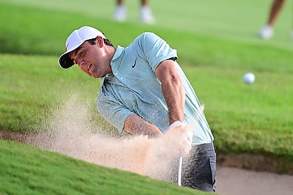 Aug 27, 2022; Atlanta, Georgia, USA; Scottie Scheffler hits from the sand on the 8th hole during the third round of the TOUR Championship golf tournament. Mandatory Credit: Adam Hagy-USA TODAY Sports