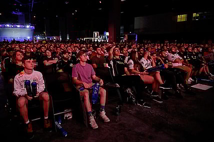 Jul 20, 2019; Miami Beach, FL, USA; Fans in attendance watch the game play between Faze Clan and 100 Thieves during the Call of Duty League Finals e-sports event at Miami Beach Convention Center. Mandatory Credit: Jasen Vinlove-USA TODAY Sports