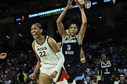 Jul 26, 2022; Chicago, IL, USA;  Las Vegas Aces forward A'ja Wilson (22) yells after scoring against Chicago Sky forward Candace Parker (3) during the second half of the Commissioners Cup-Championships at Wintrust Arena. Mandatory Credit: Matt Marton-USA TODAY Sports