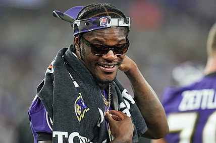 Aug 27, 2022; Baltimore, Maryland, USA;  Baltimore Ravens quarterback Lamar Jackson (8) on the sidelines during the third quarter of the game against the Washington Commanders at M&T Bank Stadium. Mandatory Credit: Jessica Rapfogel-USA TODAY Sports