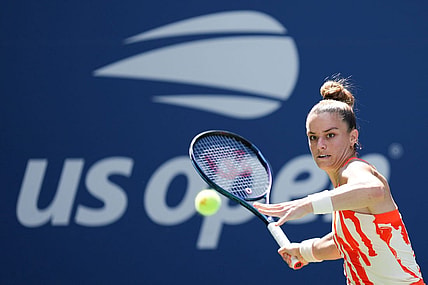 Aug 31, 2022; Flushing, NY, USA; Maria Sakkari of Greece hits to Xiyu Wang of China on day three of the 2022 U.S. Open tennis tournament at USTA Billie Jean King Tennis Center. Mandatory Credit: Danielle Parhizkaran-USA TODAY Sports