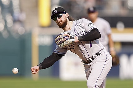 Sep 14, 2022; Chicago, Illinois, USA; Colorado Rockies second baseman Brendan Rodgers (7) throws to first base for an out against the Chicago White Sox during the sixth inning at Guaranteed Rate Field. Mandatory Credit: Kamil Krzaczynski-USA TODAY Sports