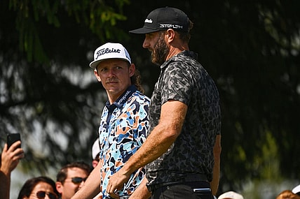 Sep 17, 2022; Chicago, Illinois, USA; Cameron Smith, left, and Dustin Johnson arrive on the the third tee during the second round of the Invitational Chicago LIV Golf tournament at Rich Harvest Farms. Mandatory Credit: Jamie Sabau-USA TODAY Sports
