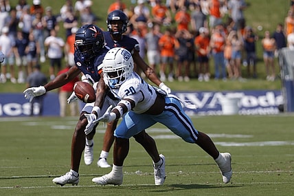 Sep 17, 2022; Charlottesville, Virginia, USA; Virginia Cavaliers wide receiver Dontayvion Wicks (3) attempts to make a catch as Old Dominion Monarchs cornerback Tobias Harris (20) defends during the first quarter at Scott Stadium. Mandatory Credit: Geoff Burke-USA TODAY Sports