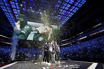 Aug 25, 2019; Detroit, MI, USA; Team Liquid celebrate and lift the trophy after winning the LCS Summer Finals event against Cloud9 at Little Caesars Arena. Mandatory Credit: Raj Mehta-USA TODAY Sports