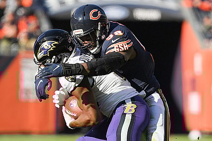 Nov 21, 2021; Chicago, Illinois, USA; Chicago Bears inside linebacker Roquan Smith (58) tackles Baltimore Ravens wide receiver Devin Duvernay (13) in the first half at Soldier Field. Mandatory Credit: Quinn Harris-USA TODAY Sports