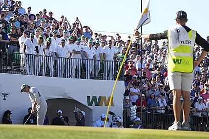 Feb 11, 2022; Scottsdale, Arizona, USA;  Rickie Fowler putts on the 16th green during Round 2 of the WM Phoenix Open at TPC Scottsdale.

Pga Phoenix Open