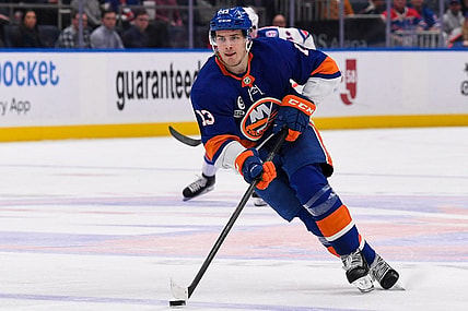 Apr 21, 2022; Elmont, New York, USA; New York Islanders center Mathew Barzal (13) skates across the blue line against the New York Rangers during the second period at UBS Arena. Mandatory Credit: Dennis Schneidler-USA TODAY Sports