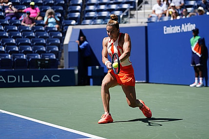 Aug 31, 2022; Flushing, NY, USA; Maria Sakkari of Greece hits to Xiyu Wang of China on day three of the 2022 U.S. Open tennis tournament at USTA Billie Jean King Tennis Center. Mandatory Credit: Danielle Parhizkaran-USA TODAY Sports