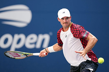 Sep 2, 2022; Flushing, NY, USA; Tommy Paul of the United States hits to Casper Ruud of Norway on day five of the 2022 U.S. Open tennis tournament at USTA Billie Jean King Tennis Center. Mandatory Credit: Danielle Parhizkaran-USA TODAY Sports