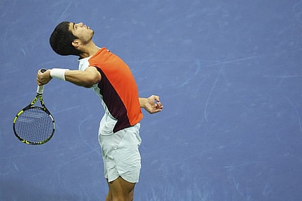 Sep 11, 2022; Flushing, NY, USA; Carlos Alcaraz (ESP) serves against Casper Ruud (NOR) (not pictured) in the men's singles final on day fourteen of the 2022 U.S. Open tennis tournament at USTA Billie Jean King Tennis Center. Mandatory Credit: Danielle Parhizkaran-USA TODAY Sports