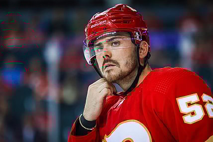 Oct 3, 2022; Calgary, Alberta, CAN; Calgary Flames defenseman MacKenzie Weegar (52) reacts against the Seattle Kraken during the second period at Scotiabank Saddledome. Mandatory Credit: Sergei Belski-USA TODAY Sports