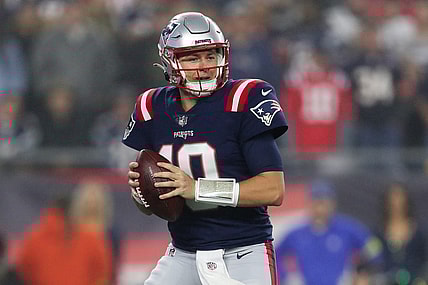 Oct 24, 2022; Foxborough, Massachusetts, USA; New England Patriots quarterback Mac Jones (10) drops back to pass during the first half against the Chicago Bears at Gillette Stadium. Mandatory Credit: Paul Rutherford-USA TODAY Sports