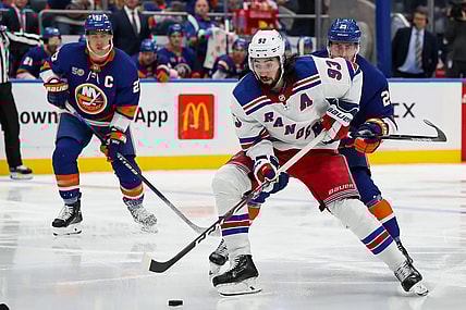 Oct 26, 2022; Elmont, New York, USA; New York Rangers center Mika Zibanejad (93) skates with the puck against the New York Islanders during the third period at UBS Arena. Mandatory Credit: Tom Horak-USA TODAY Sports