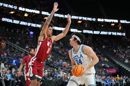 Mar 10, 2022; Las Vegas, NV, USA; Washington State Cougars forward DJ Rodman (11) defends against UCLA Bruins guard Jaime Jaquez Jr. (24) during the first half at T-Mobile Arena. Mandatory Credit: Stephen R. Sylvanie-USA TODAY Sports