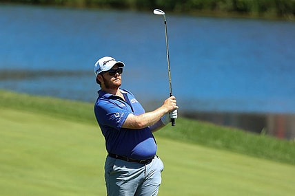 Jul 21, 2022; Blaine, Minnesota, USA; Harry Higgs hits an approach shot from the fairway on the 7th hole during the first round of the 3M Open golf tournament. Mandatory Credit: Matt Krohn-USA TODAY Sports