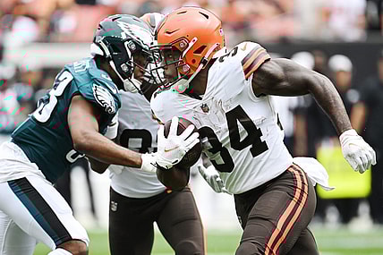 Aug 21, 2022; Cleveland, Ohio, USA; Cleveland Browns running back Jerome Ford (34) runs with the ball as Philadelphia Eagles cornerback Josiah Scott (33) defends during the first half at FirstEnergy Stadium. Mandatory Credit: Ken Blaze-USA TODAY Sports