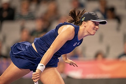 Nov 3, 2022; Forth Worth, TX, USA; Iga Swiatek (POL) serves during her match against Caroline Garcia (FRA) on day four of the WTA Finals at Dickies Arena. Mandatory Credit: Susan Mullane-USA TODAY Sports