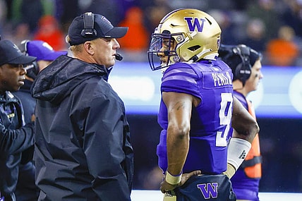 Nov 4, 2022; Seattle, Washington, USA; Washington Huskies head coach Kalen DeBoer talks with quarterback Michael Penix Jr. (9) during a fourth quarter timeout at Alaska Airlines Field at Husky Stadium. Mandatory Credit: Joe Nicholson-USA TODAY Sports