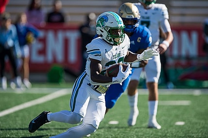 Nov 5, 2022; Tulsa, Oklahoma, USA;  Tulane Green Wave running back Tyjae Spears (22) runs the ball during the first quarter against the Tulsa Golden Hurricane at Skelly Field at H.A. Chapman Stadium. Mandatory Credit: Brett Rojo-USA TODAY Sports