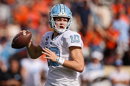 Nov 5, 2022; Charlottesville, Virginia, USA; North Carolina Tar Heels quarterback Drake Maye (10) attempts a pass against the Virginia Cavaliers during the second half at Scott Stadium. Mandatory Credit: Scott Taetsch-USA TODAY Sports