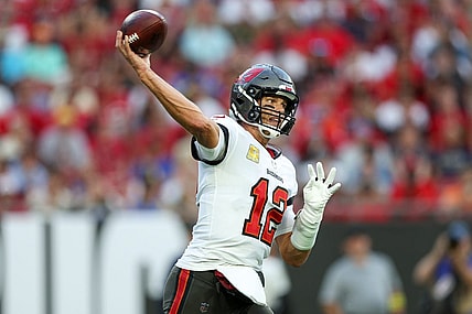 Nov 6, 2022; Tampa, Florida, USA;  Tampa Bay Buccaneers quarterback Tom Brady (12) drops back to pass against the Los Angeles Rams in the first quarter at Raymond James Stadium. Mandatory Credit: Nathan Ray Seebeck-USA TODAY Sports