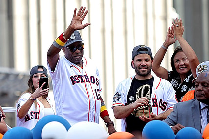 Nov 7, 2022; Houston, Texas, USA; Houston Astros manager Dusty Baker Jr. (12, left) and Houston Astros second baseman Jose Altuve (27) both wave to the crowd atop a parade vehicle during the Houston Astros Championship Parade in Houston, TX. Mandatory Credit: Erik Williams-USA TODAY Sports