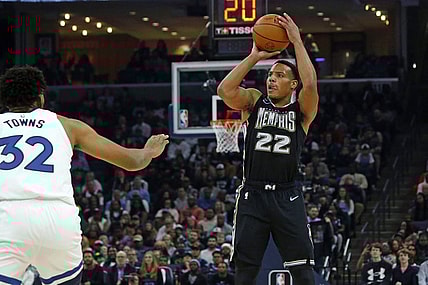 Nov 11, 2022; Memphis, Tennessee, USA; Memphis Grizzlies guard Desmond Bane (22) shoots for three during the first half against the Minnesota Timberwolves at FedExForum. Mandatory Credit: Petre Thomas-USA TODAY Sports