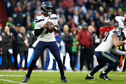 Nov 13, 2022; Munich, Germany, DEU; Seattle Seahawks quarterback Geno Smith (7) looks to pass against the Tampa Bay Buccaneers during the second quarter of an International Series game at Allianz Arena. Mandatory Credit: Douglas DeFelice-USA TODAY Sports