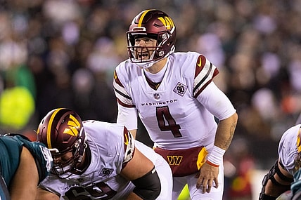Nov 14, 2022; Philadelphia, Pennsylvania, USA; Washington Commanders quarterback Taylor Heinicke (4) prepares to snap the ball during the third quarter against the Philadelphia Eagles at Lincoln Financial Field. Mandatory Credit: Bill Streicher-USA TODAY Sports