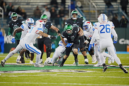 Nov 17, 2022; New Orleans, Louisiana, USA; Tulane Green Wave quarterback Michael Pratt (7) runs the ball against the Southern Methodist Mustangs during the first half at Yulman Stadium. Mandatory Credit: Andrew Wevers-USA TODAY Sports