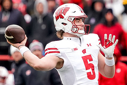 Nov 19, 2022; Lincoln, Nebraska, USA; Wisconsin Badgers quarterback Graham Mertz (5) throws a pass against the Nebraska Cornhuskers during the second quarter at Memorial Stadium. Mandatory Credit: Dylan Widger-USA TODAY Sports