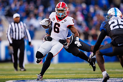 Nov 19, 2022; Lexington, Kentucky, USA; Georgia Bulldogs running back Kenny McIntosh (6) runs the ball during the first quarter against the Kentucky Wildcats at Kroger Field. Mandatory Credit: Jordan Prather-USA TODAY Sports
