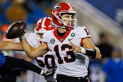 Nov 19, 2022; Lexington, Kentucky, USA; Georgia Bulldogs quarterback Stetson Bennett (13) passes the ball against the Kentucky Wildcats during the third quarter at Kroger Field. Mandatory Credit: Jordan Prather-USA TODAY Sports