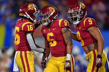 Nov 19, 2022; Pasadena, California, USA; Southern California Trojans running back Austin Jones (6) celebrates his touchdown scored against the UCLA Bruins with wide receiver Tahj Washington (16) and wide receiver Michael Jackson III (9) during the first half at the Rose Bowl. Mandatory Credit: Gary A. Vasquez-USA TODAY Sports