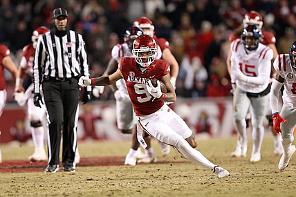 Nov 19, 2022; Fayetteville, Arkansas, USA; Arkansas Razorbacks wide receiver Jadon Haselwood (9) runs after a catch in the second quarter against the Ole Miss Rebels at Donald W. Reynolds Razorback Stadium. Mandatory Credit: Nelson Chenault-USA TODAY Sports